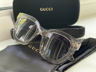 Солнцезащитные очки Gucci